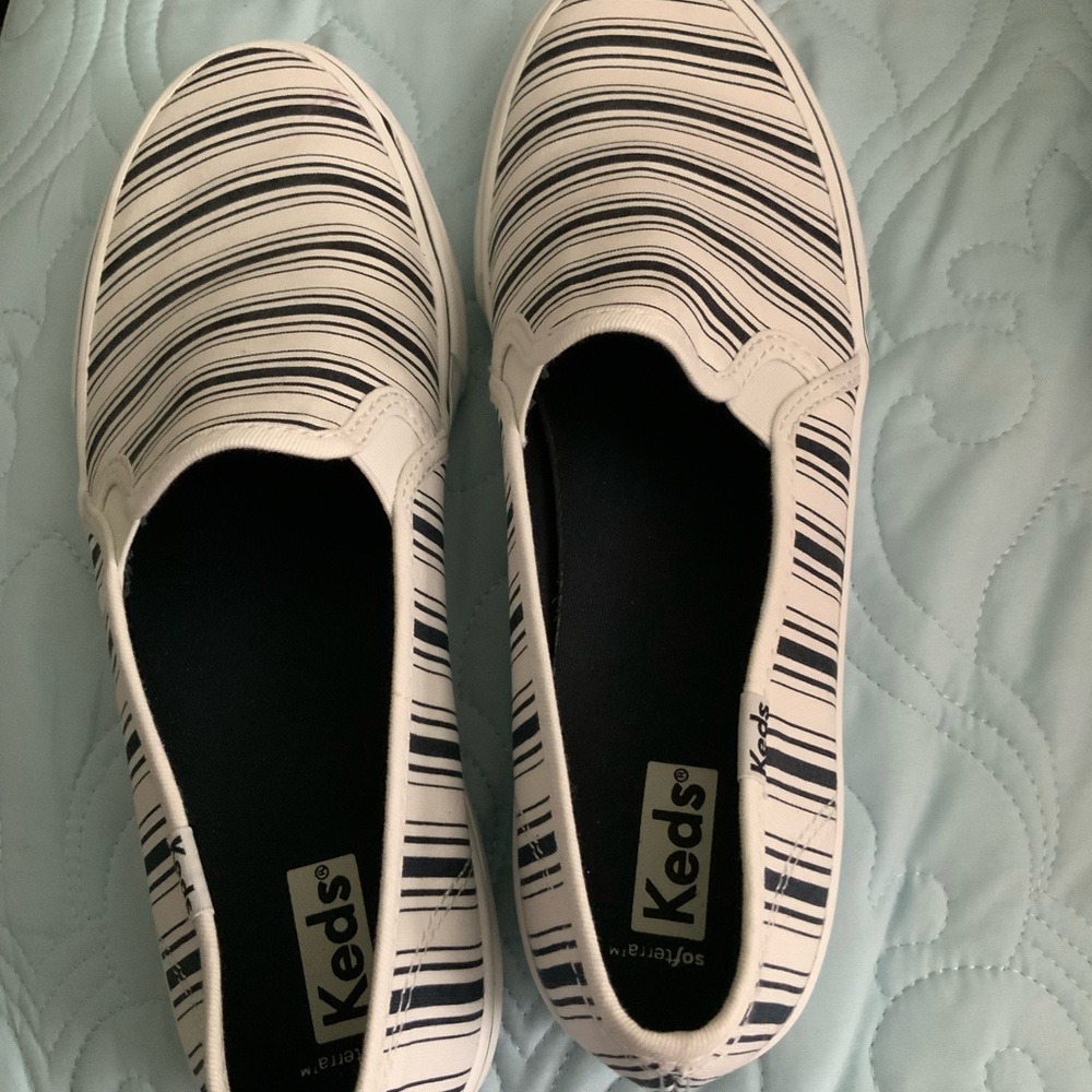 Keds Slip-On Sneakers in White with Black Stripes